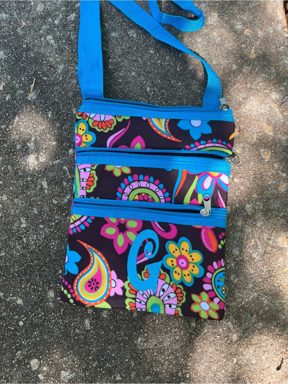 Multicolor Floral Paisley Crossbody Bag with Blue Strap.